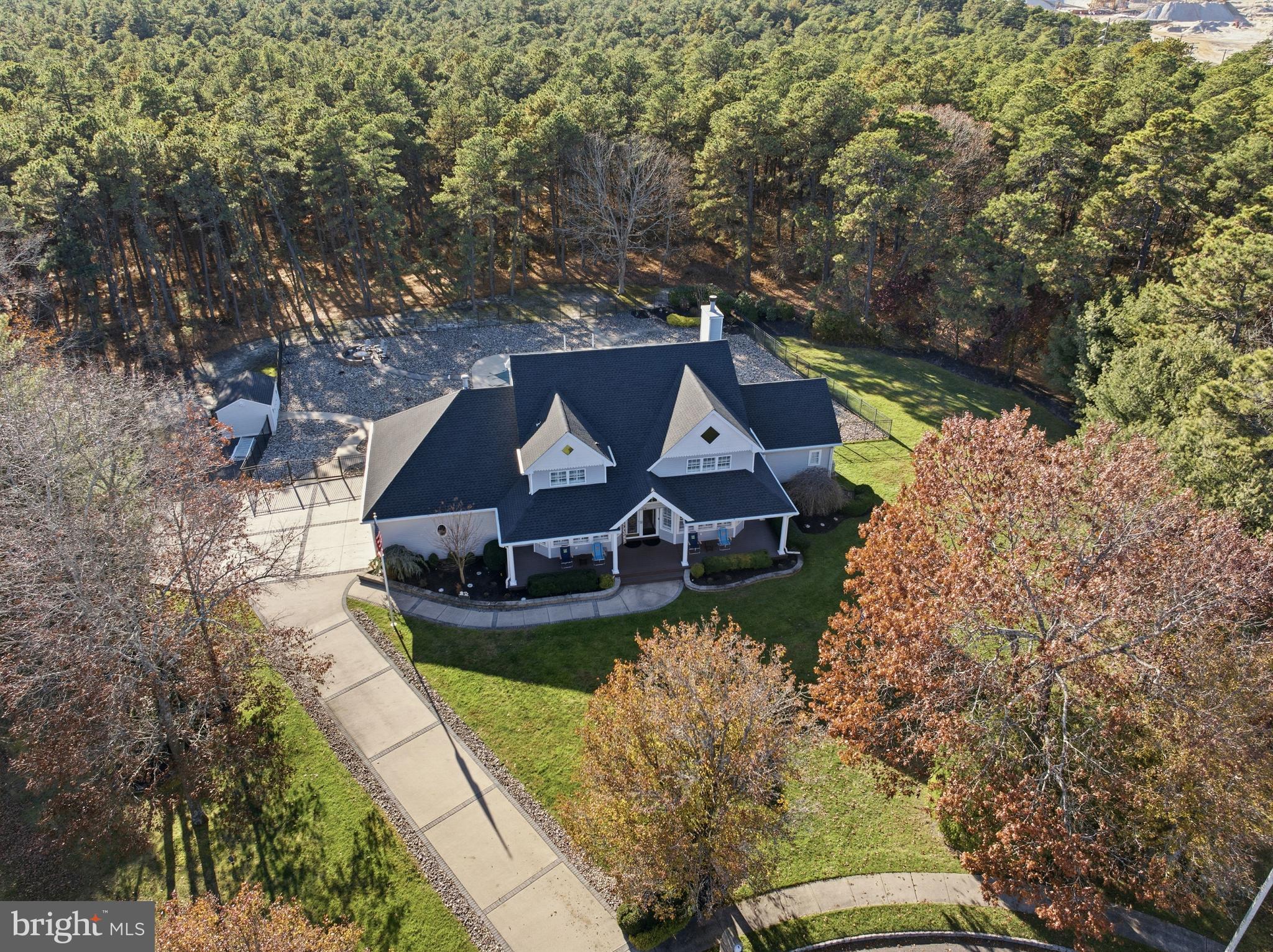 39 Rodeo Drive West Creek, NJ 08092 - Photo 77 of 78 an aerial view of a house with yard swimming pool and outdoor seating