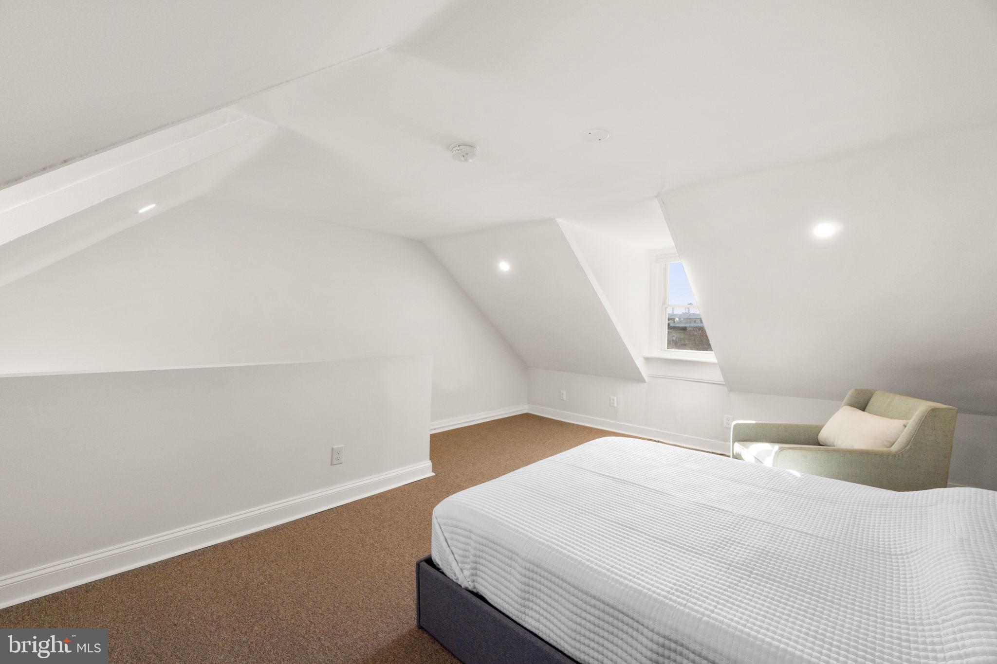 1827 Bank Street Baltimore, MD 21231 - Photo 23 of 31 Cozy attic retreat with natural light.