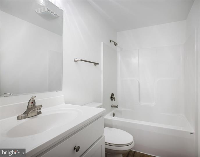 Racers Lane Berkeley Springs, WV 25411 - Photo 19 of 24 a bathroom with a sink a toilet and a bathtub