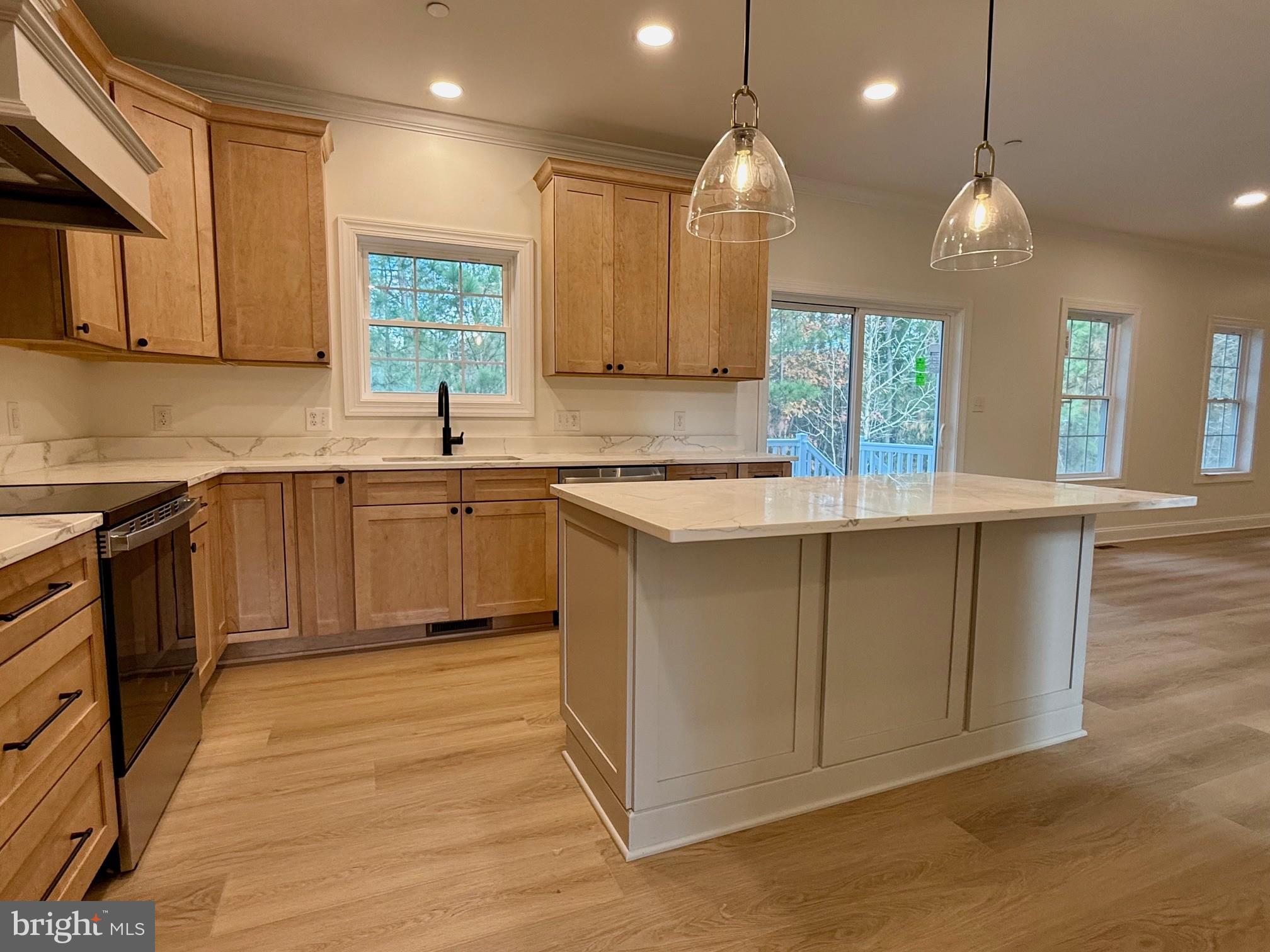 17490 Lighthouse Commons Drive Piney Point, MD 20674 - Photo 22 of 44 a kitchen with a sink cabinets and window