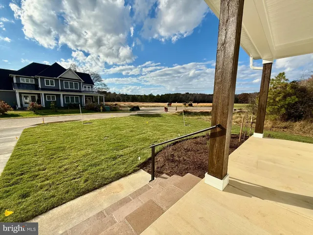 a view of a swimming pool with an ocean view