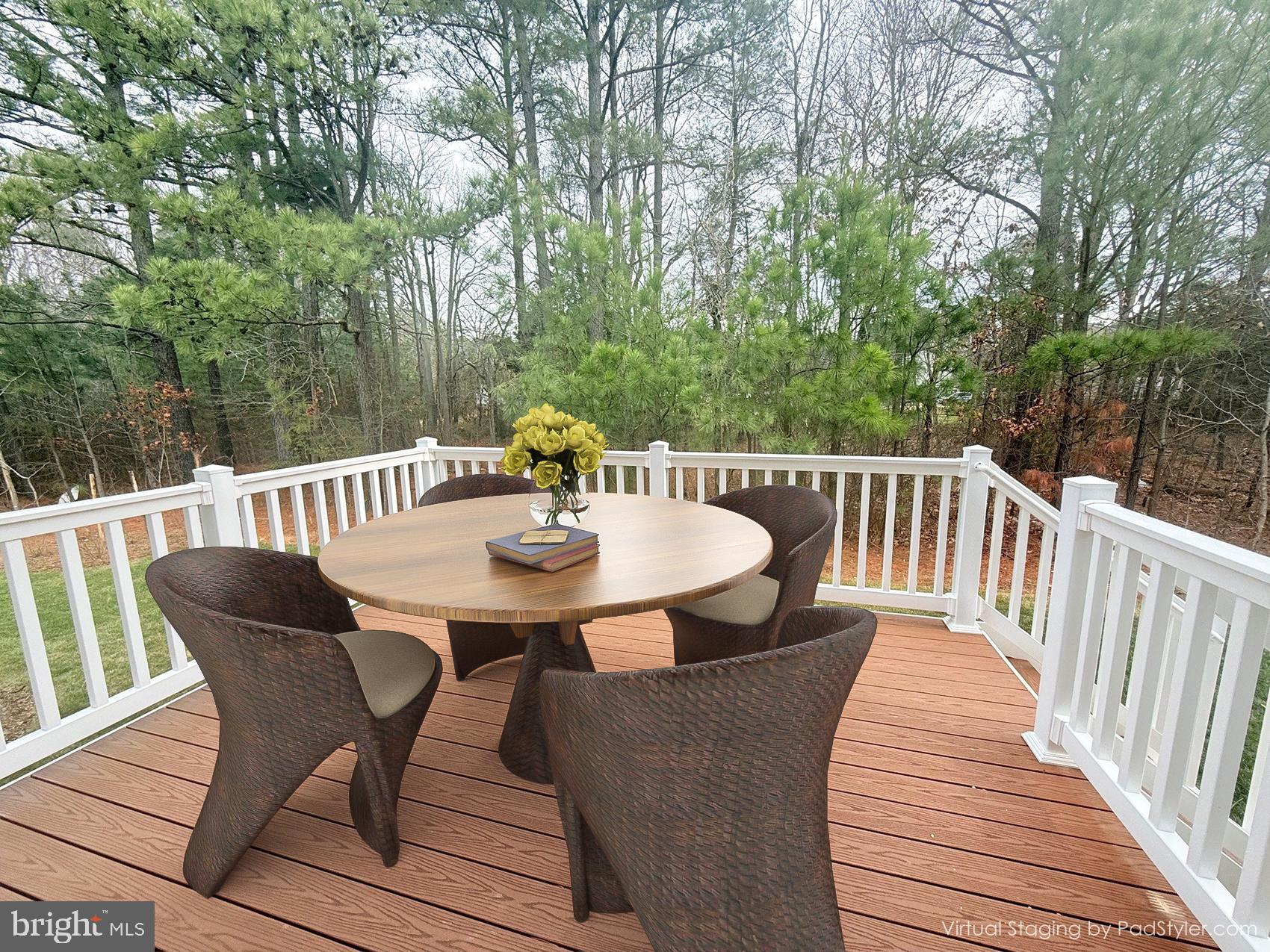 17490 Lighthouse Commons Drive Piney Point, MD 20674 - Photo 43 of 44 a view of a table and chairs on the roof deck