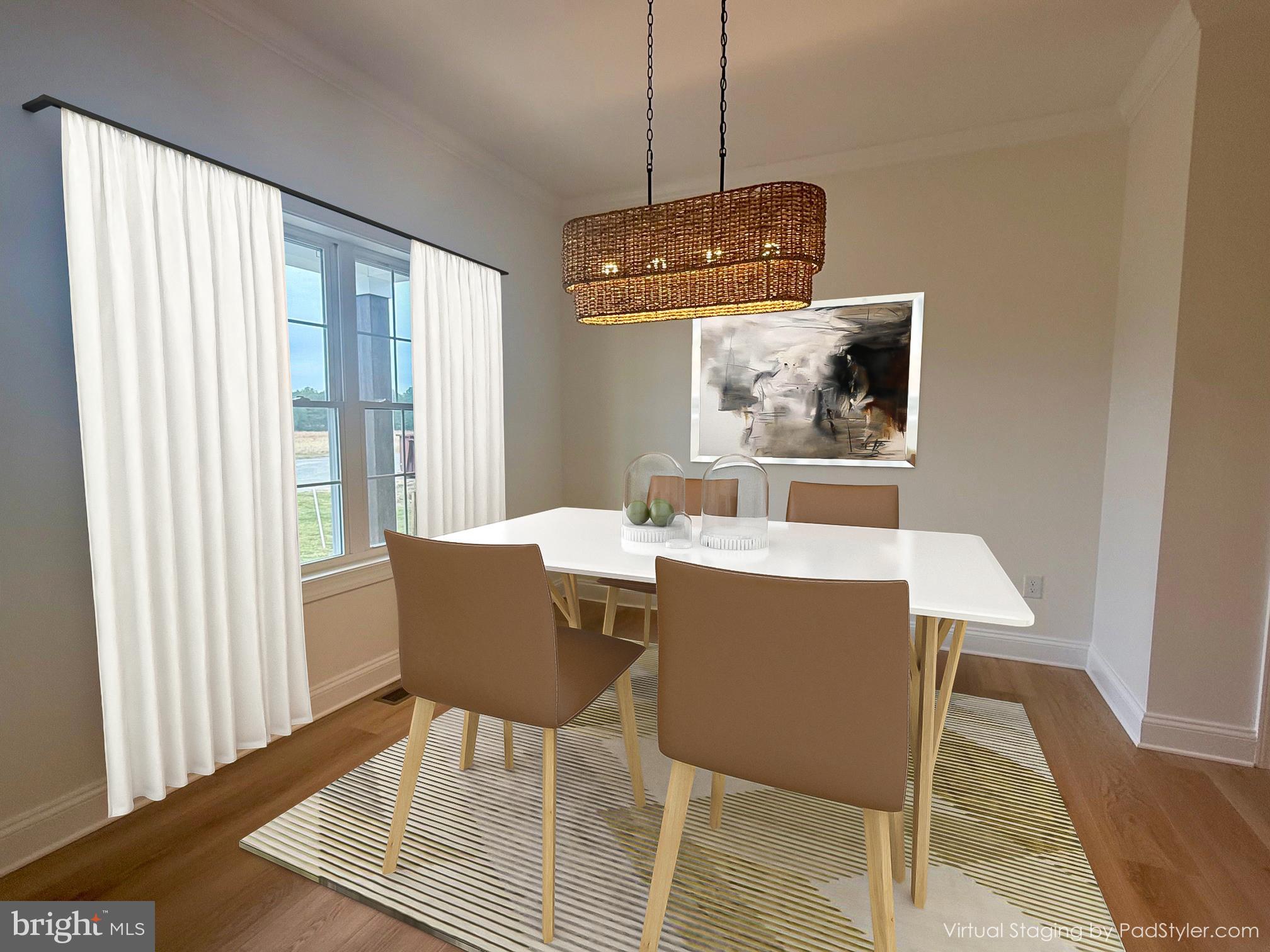 17490 Lighthouse Commons Drive Piney Point, MD 20674 - Photo 5 of 44 a dining room with wooden floor and a chandelier