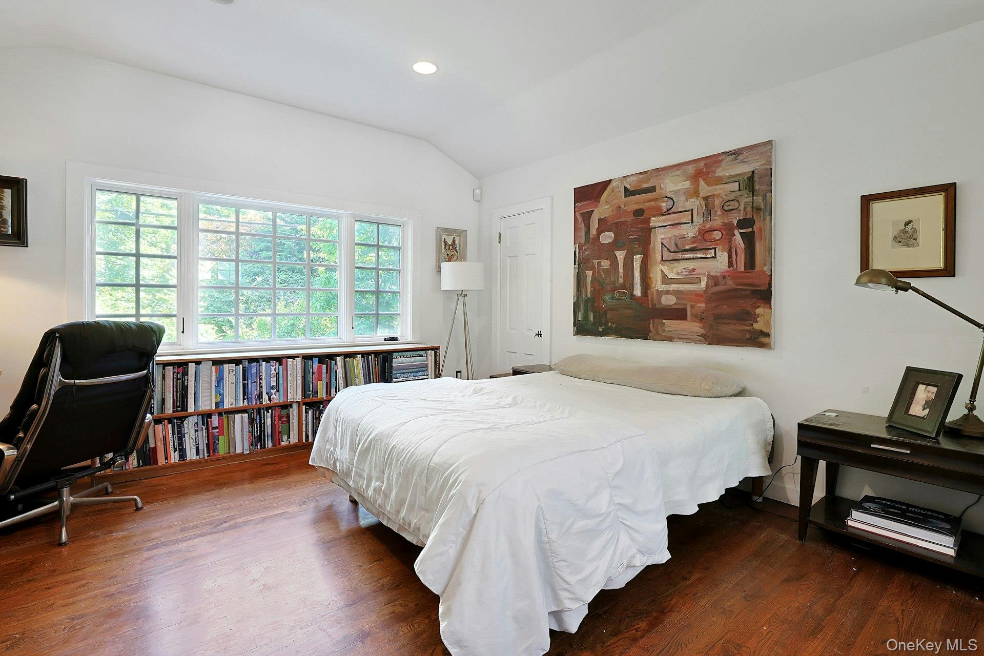 65 Douglas Road Chappaqua, NY 10514 - Photo 26 of 41 The primary bedroom offers walk-in closets, generous storage, and a beautiful view outside that brings a sense of calm to the space. Reinstall doors for additional privacy.