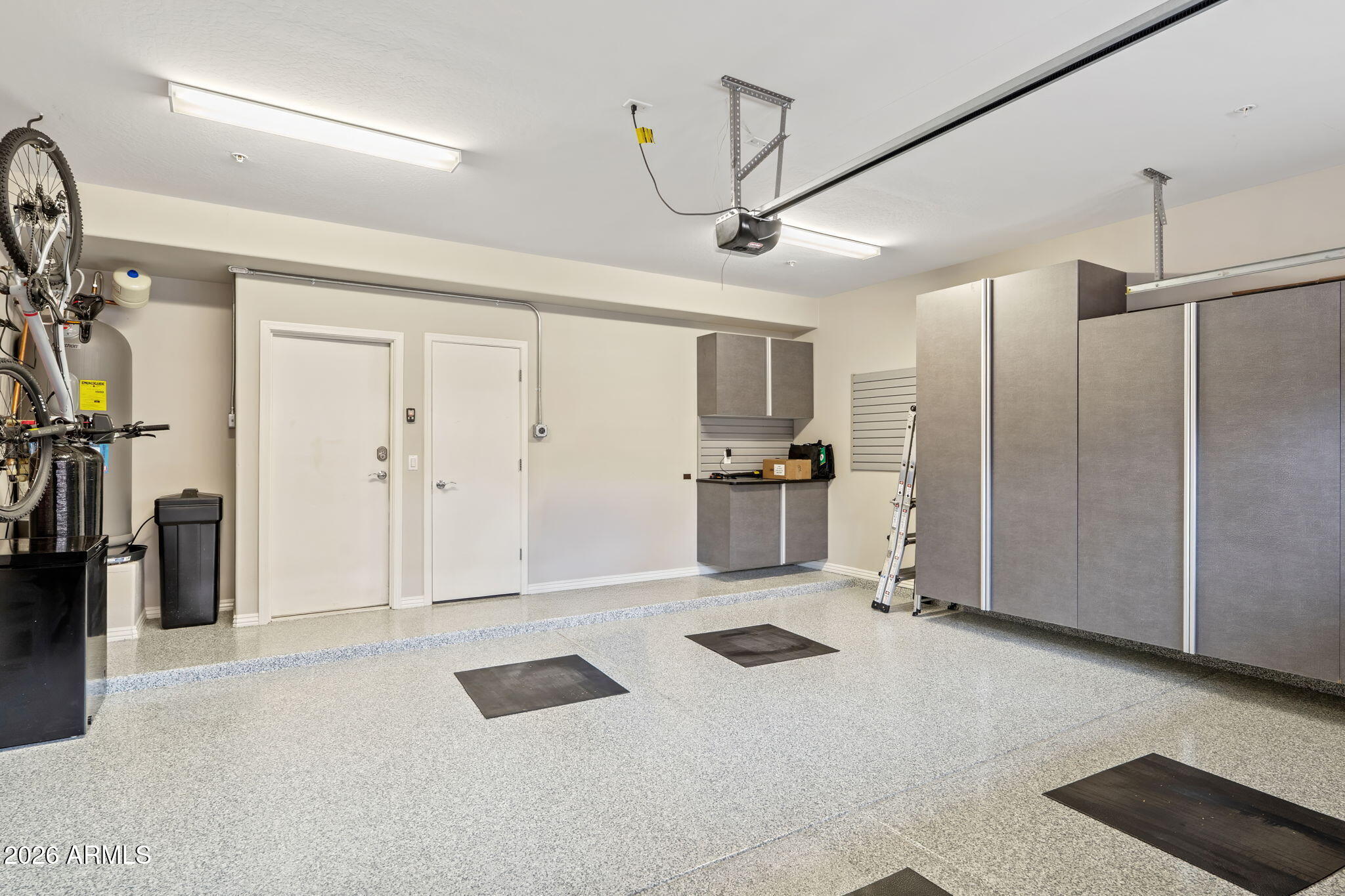 3935 East Rough Rider Road, Unit 1332 Phoenix, AZ 85050 - Photo 29 of 35 Custom Cabinets and Fresh Epoxy Floor!