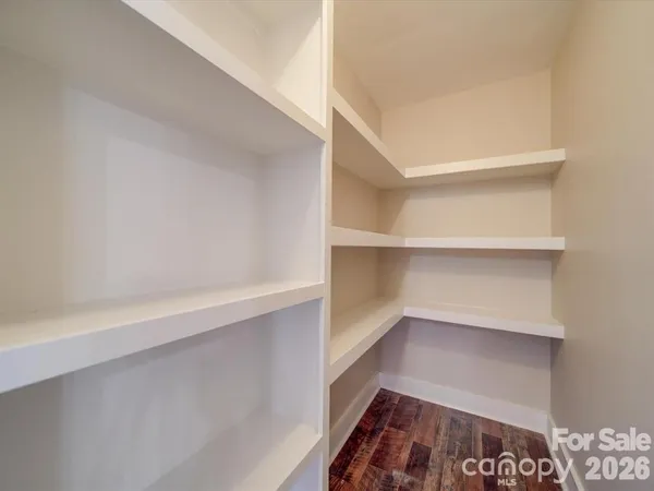 a view of an empty walk in closet
