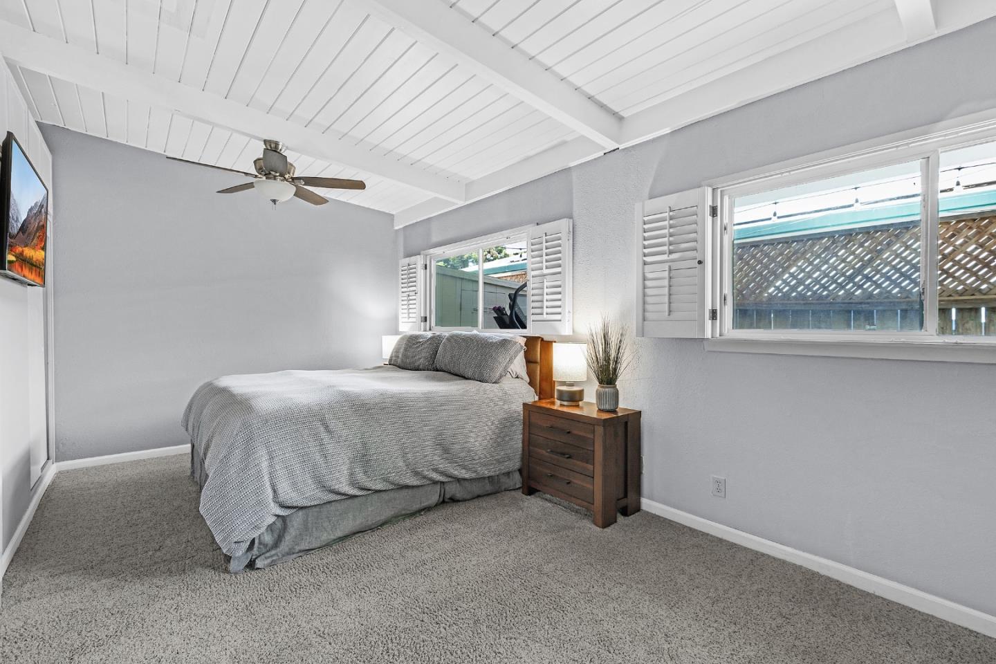 811 Wake Forest Drive Mountain View, CA 94043 - Photo 15 of 28 a spacious bedroom with a bed and a cabinets