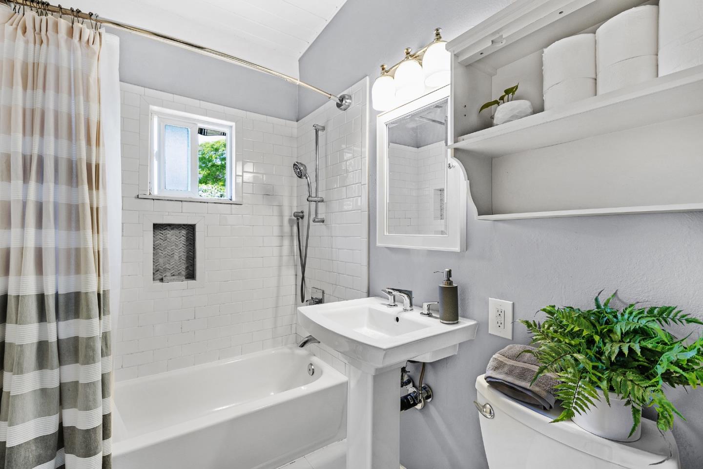 811 Wake Forest Drive Mountain View, CA 94043 - Photo 17 of 28 a bathroom with a sink a toilet and shower
