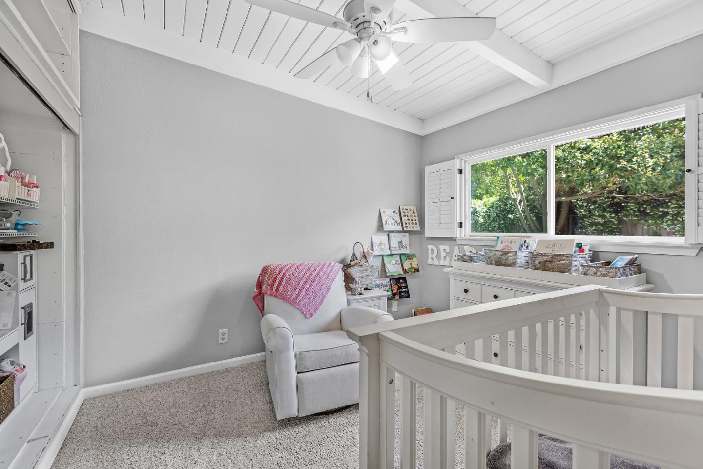 811 Wake Forest Drive Mountain View, CA 94043 - Photo 18 of 28 a living room with furniture a window and a chandelier