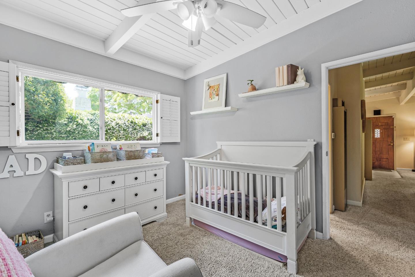 811 Wake Forest Drive Mountain View, CA 94043 - Photo 19 of 28 a bedroom with furniture and a window