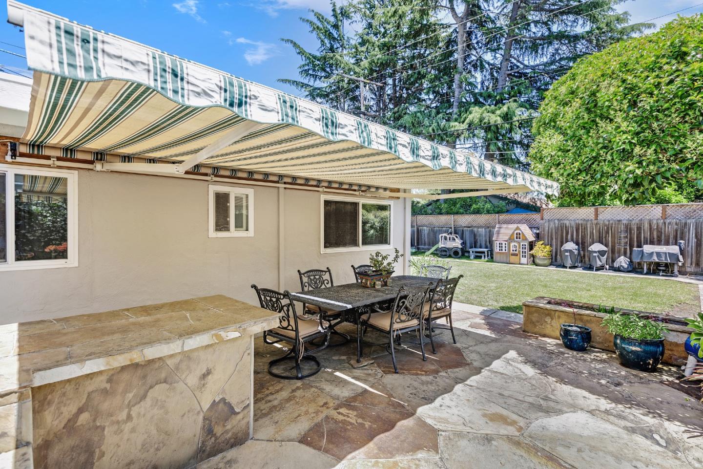 811 Wake Forest Drive Mountain View, CA 94043 - Photo 21 of 28 a backyard of a house with table and chairs
