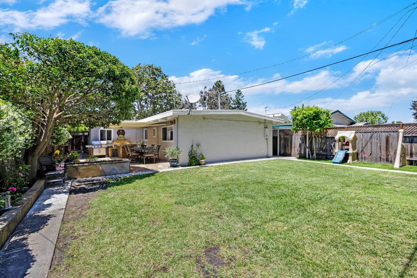 811 Wake Forest Drive Mountain View, CA 94043 - Photo 23 of 28 a view of a house with backyard and sitting area