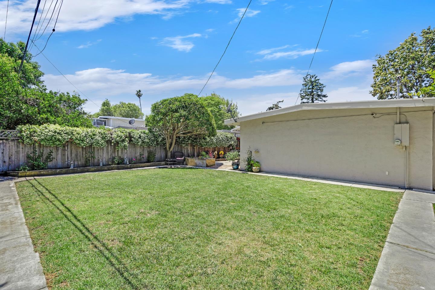 811 Wake Forest Drive Mountain View, CA 94043 - Photo 25 of 28 a backyard of a house with lots of green space