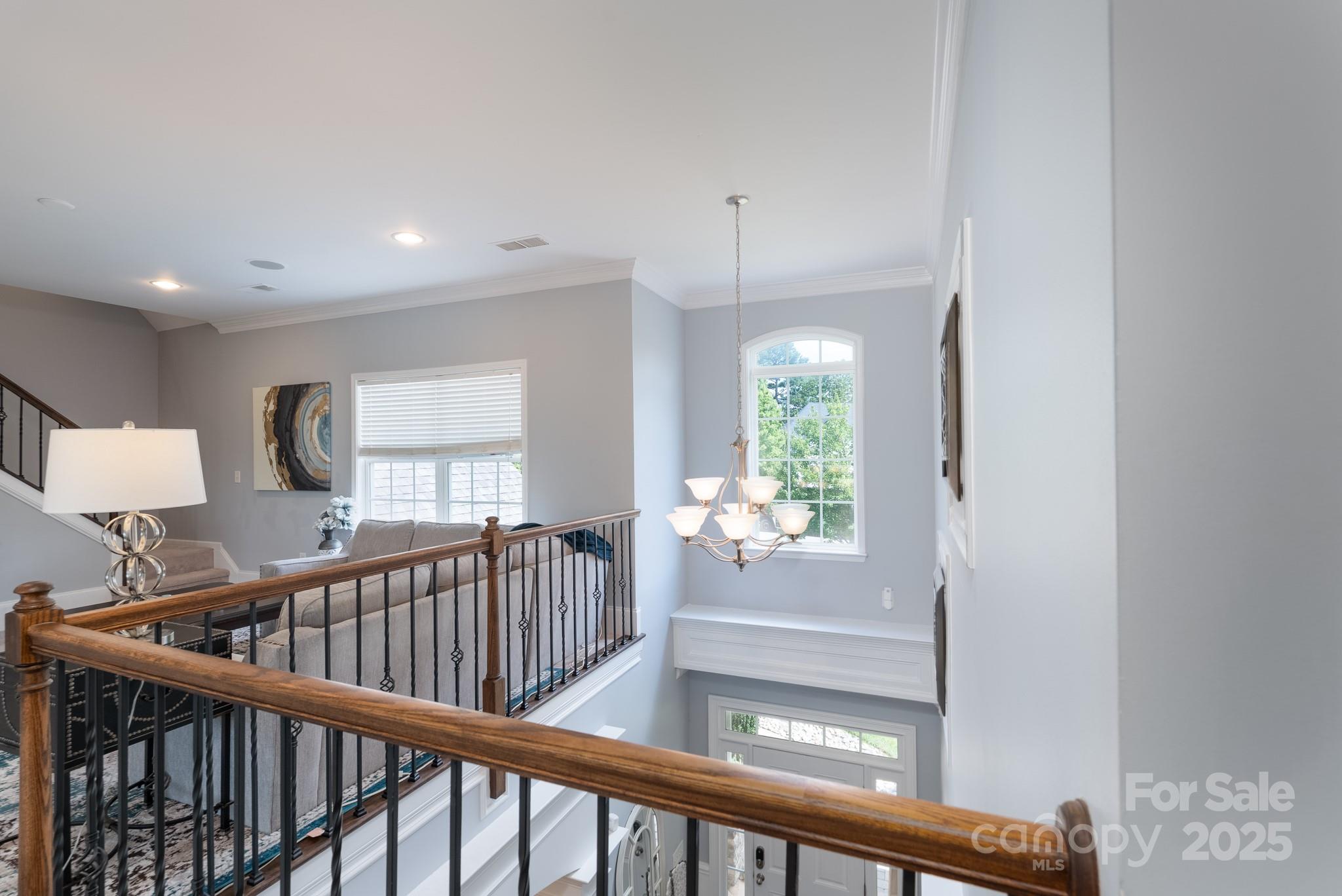 779 Fairway Point Drive Tega Cay, SC 29708 - Photo 28 of 48 a view of a hallway with windows