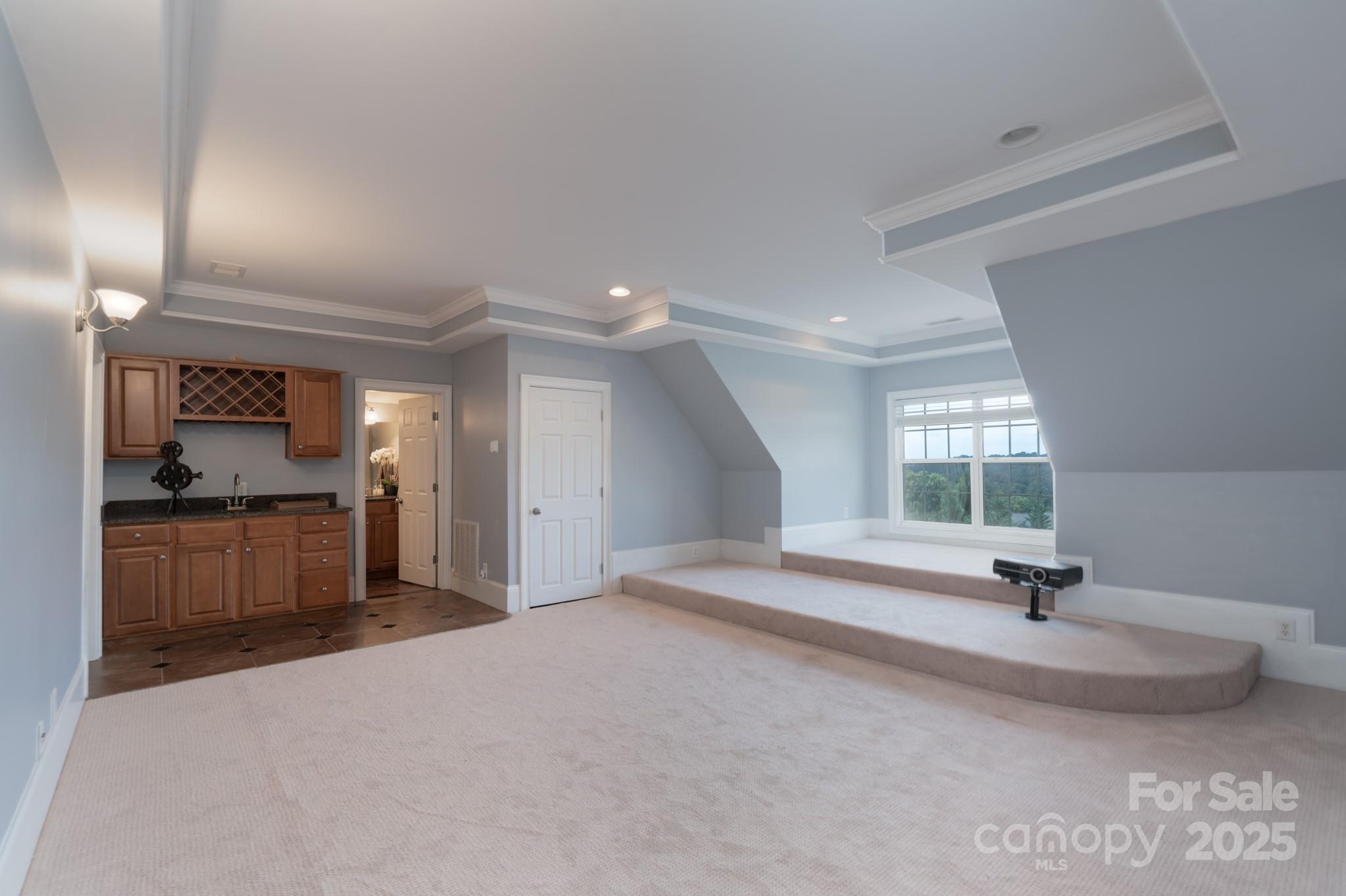 779 Fairway Point Drive Tega Cay, SC 29708 - Photo 32 of 48 a view of an empty room and window