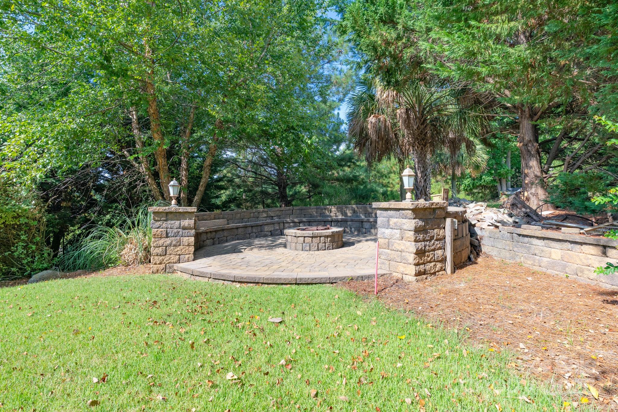 779 Fairway Point Drive Tega Cay, SC 29708 - Photo 42 of 48 a view of a backyard with sitting area