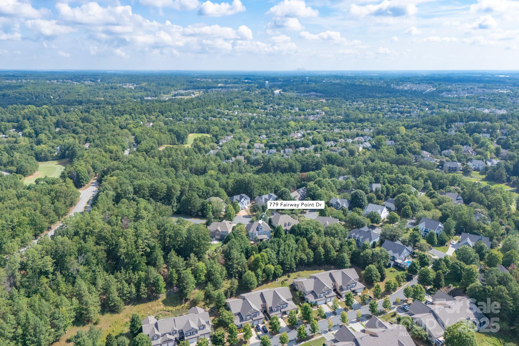 779 Fairway Point Drive Tega Cay, SC 29708 - Photo 46 of 48 an aerial view of a city with lots of residential buildings