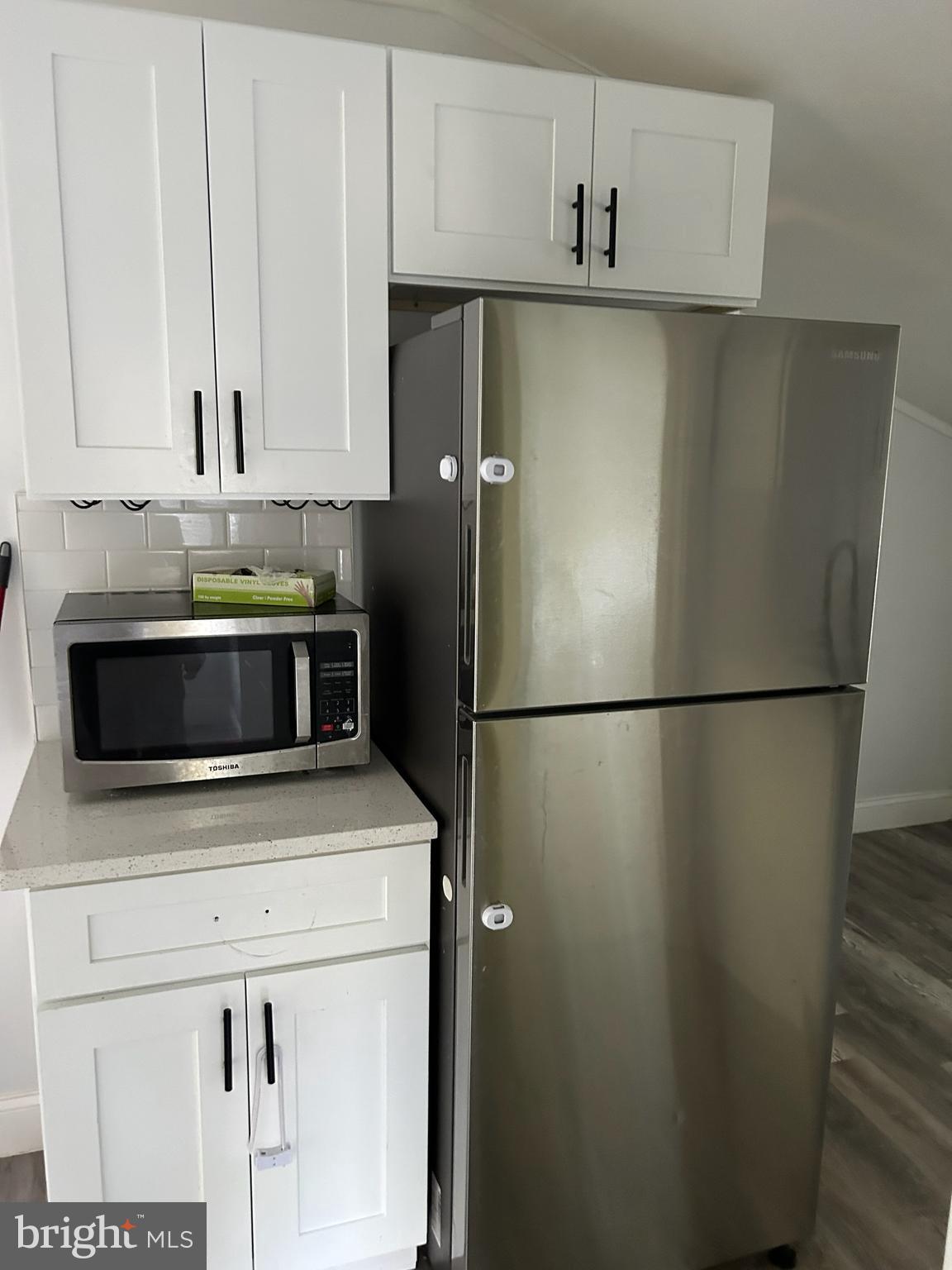 253 Harding Avenue, Unit 3 Clementon, NJ 08021 - Photo 2 of 9 a kitchen with stainless steel appliances a refrigerator sink and cabinets