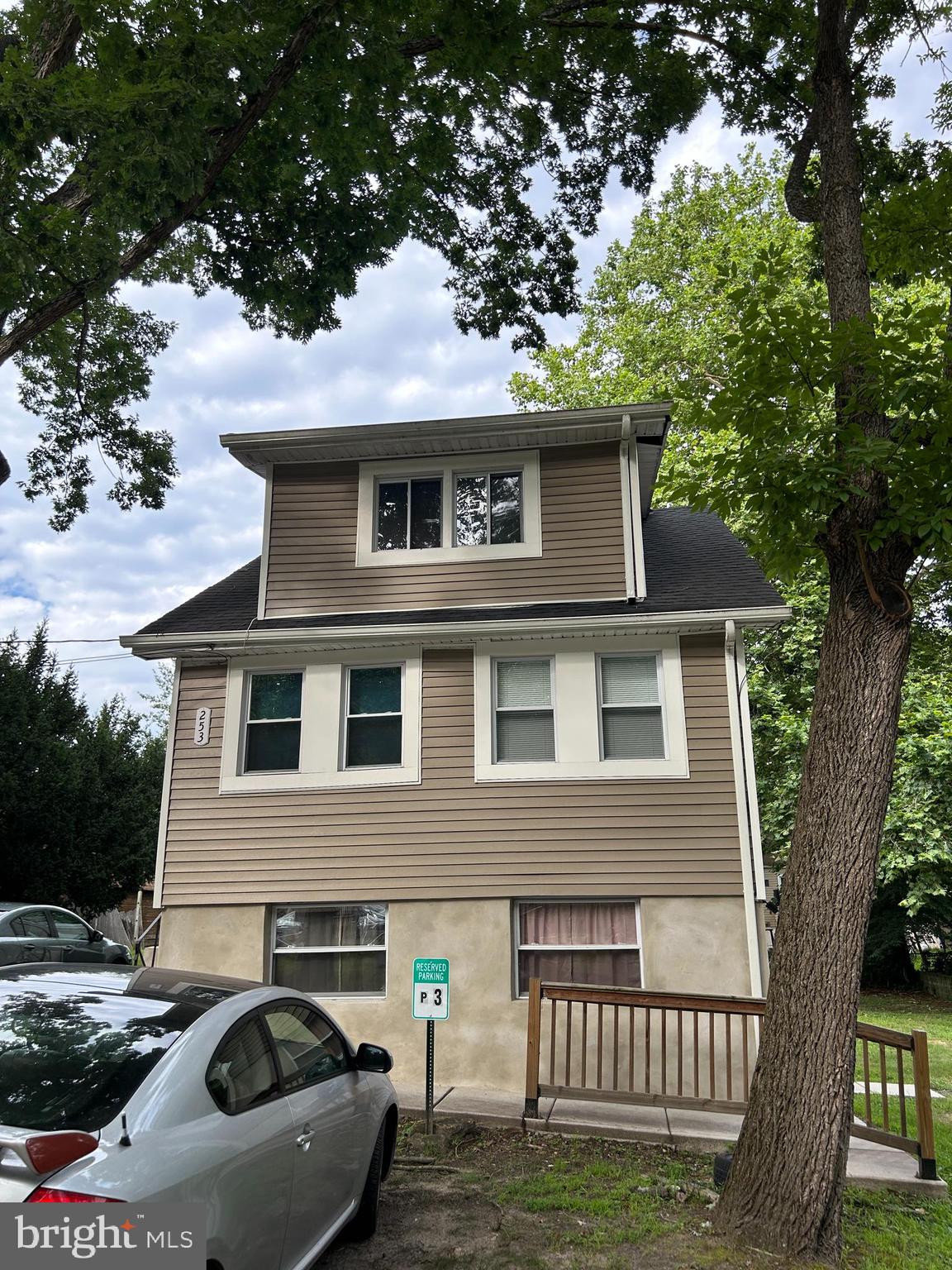 253 Harding Avenue, Unit 3 Clementon, NJ 08021 - Photo 8 of 9 a front view of a house with a garden