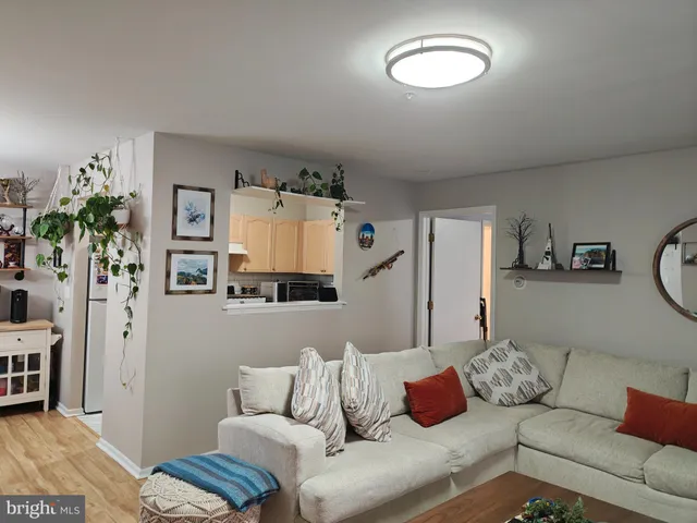 a living room with furniture and a couch