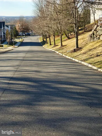 a view of road with trees