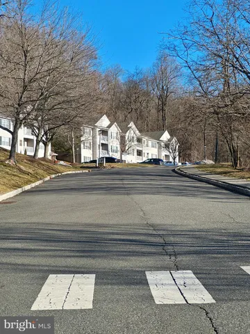 a view of a building with a street