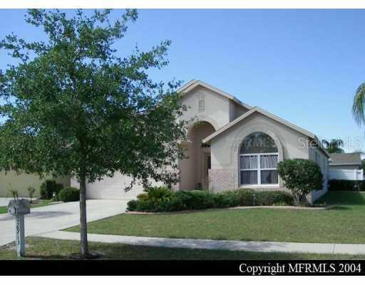 12913 Raysbrook Drive Riverview, FL 33569 - Photo 1 of 1 a front view of a house with a yard