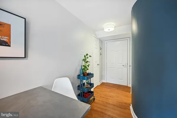 a workspace room with furniture