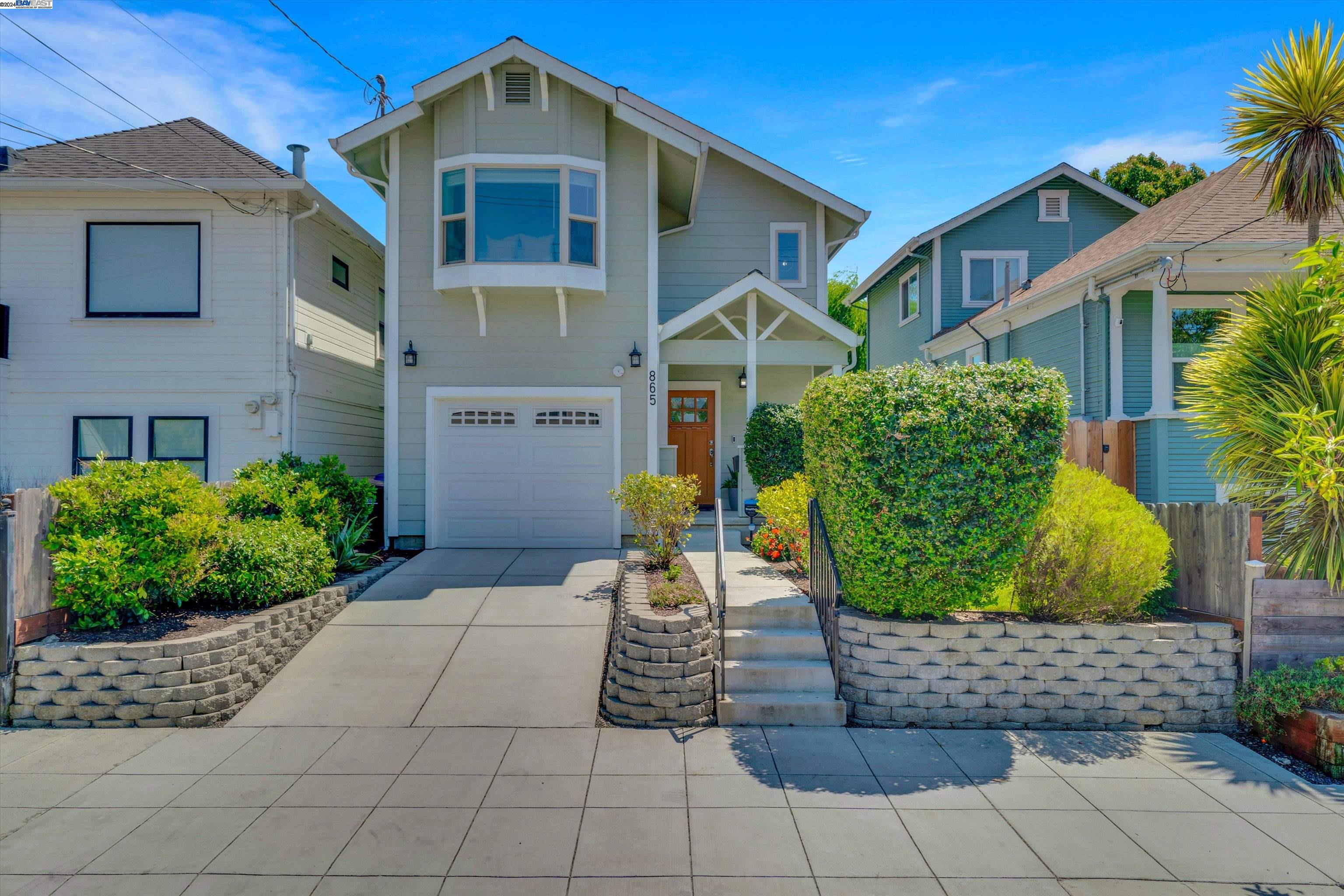 865 43rd Street Oakland, CA 94608 - Photo 1 of 1 a front view of a house with garden