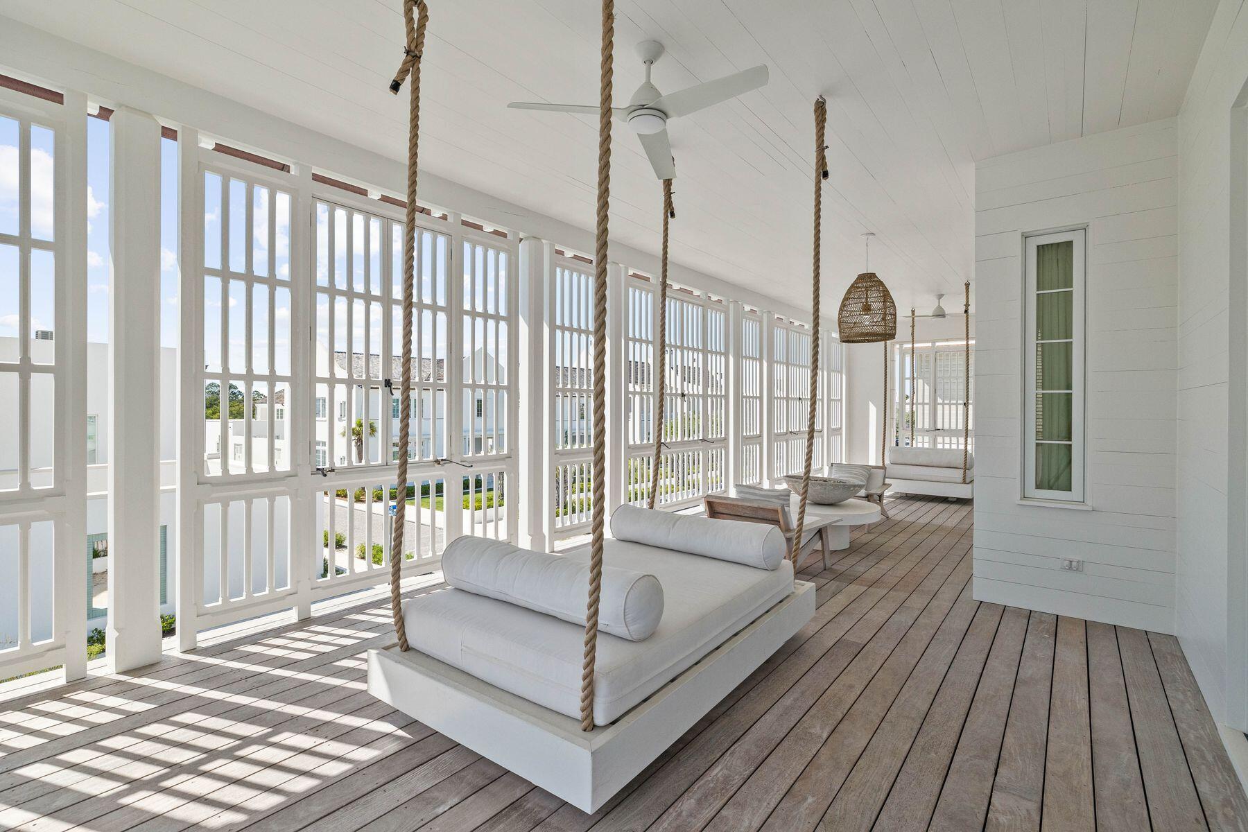 74 Kaiya Ave Inlet Beach Inlet Beach, FL 32461 - Photo 17 of 49 a spacious bedroom with a bed and a wooden floor