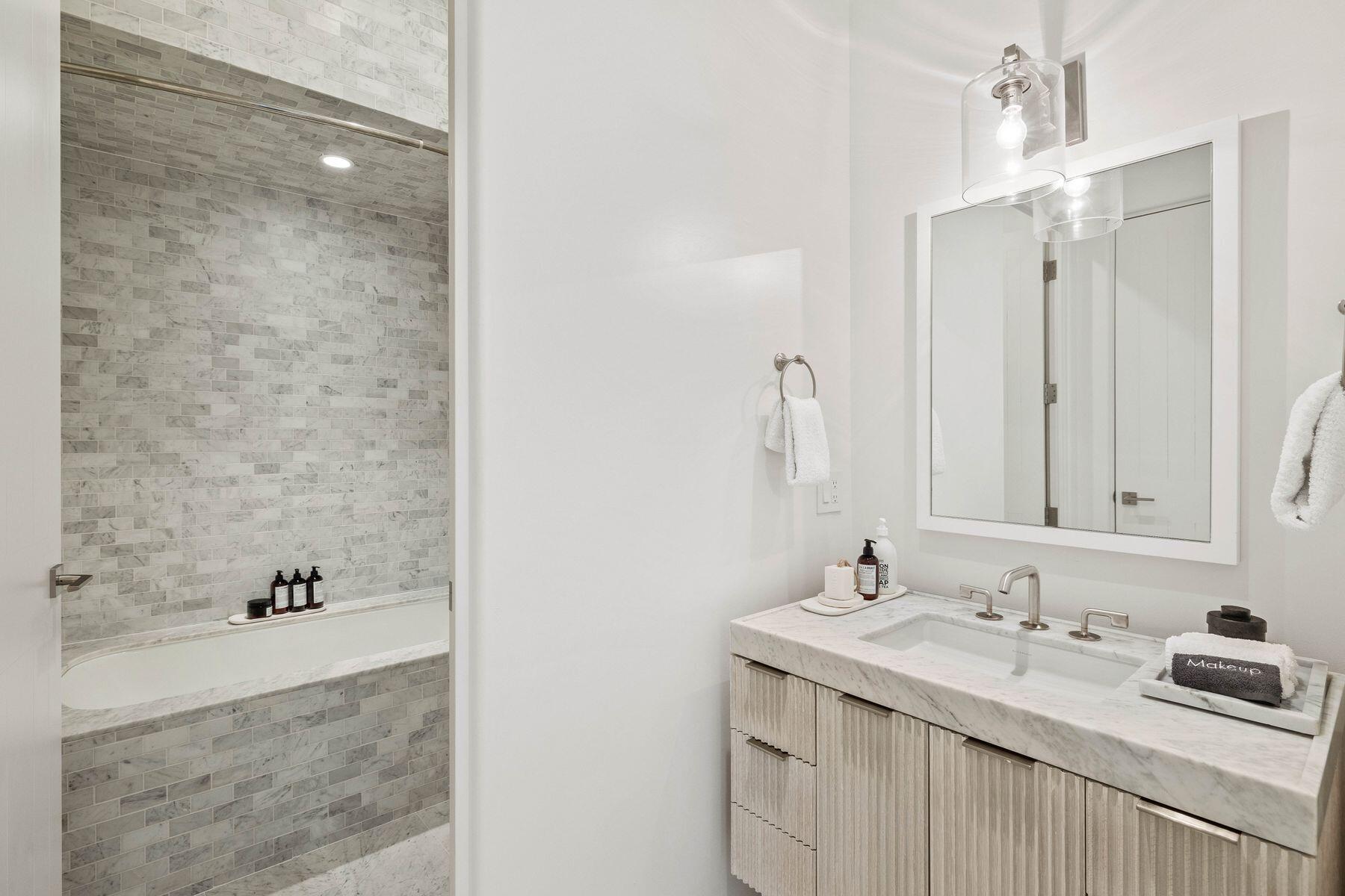 74 Kaiya Ave Inlet Beach Inlet Beach, FL 32461 - Photo 23 of 49 a bathroom with a granite countertop sink and a mirror