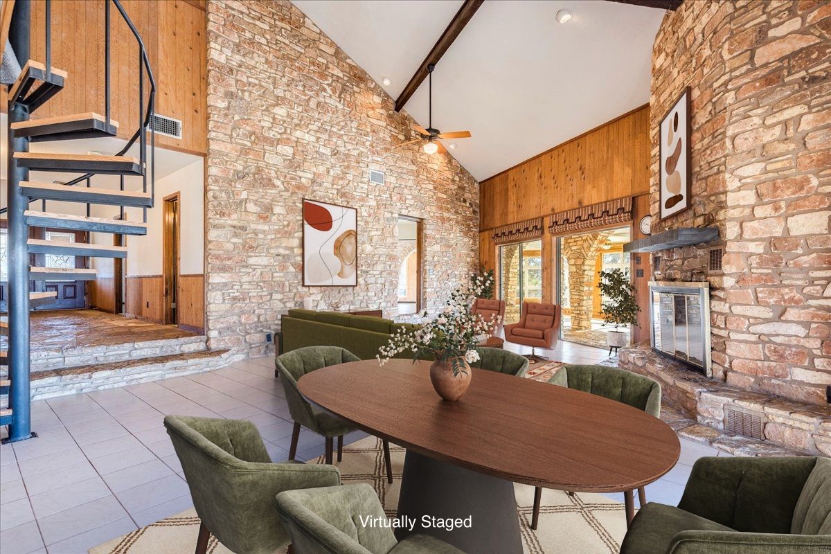 9763 Ranch Road 1623 Blanco, TX 78606 - Photo 12 of 40 a view of a patio with a table and chairs