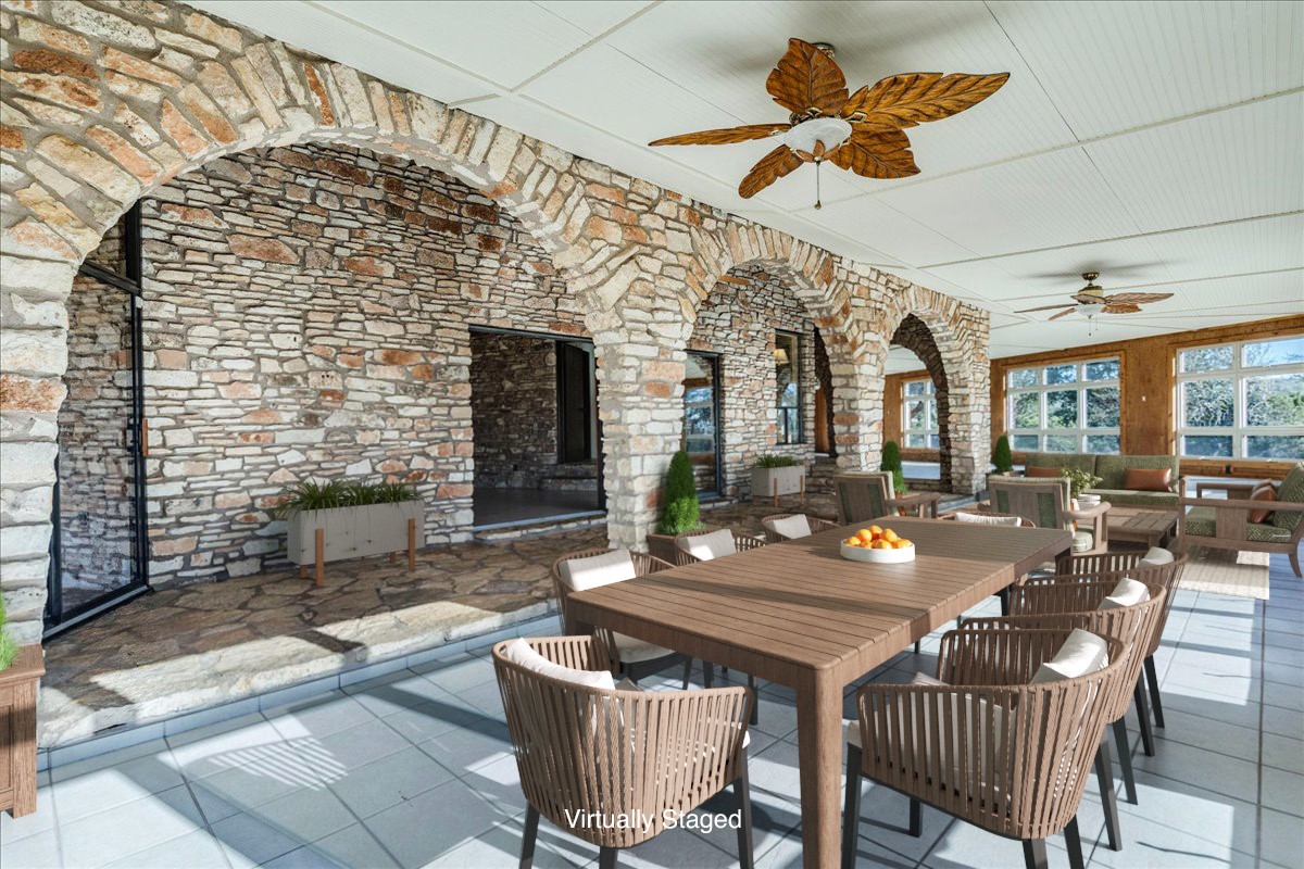 9763 Ranch Road 1623 Blanco, TX 78606 - Photo 14 of 40 a view of a patio with a table and chairs