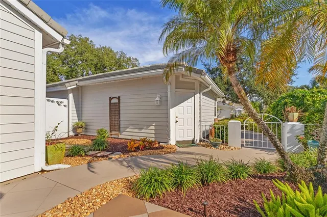 a kitchen with sink cabinets and window