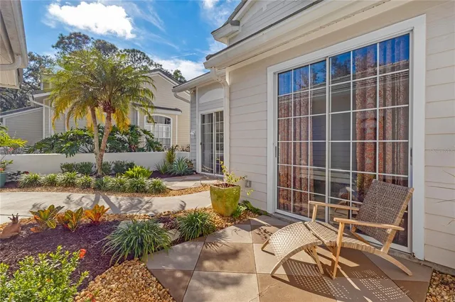 a kitchen with kitchen island white cabinets and chandelier