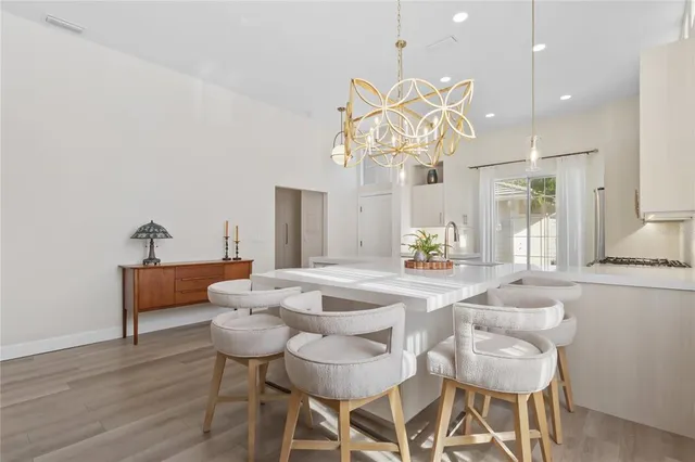 a outdoor living room with furniture and a window