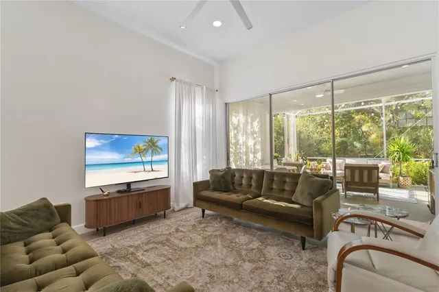 a bed room with a bed and a chair