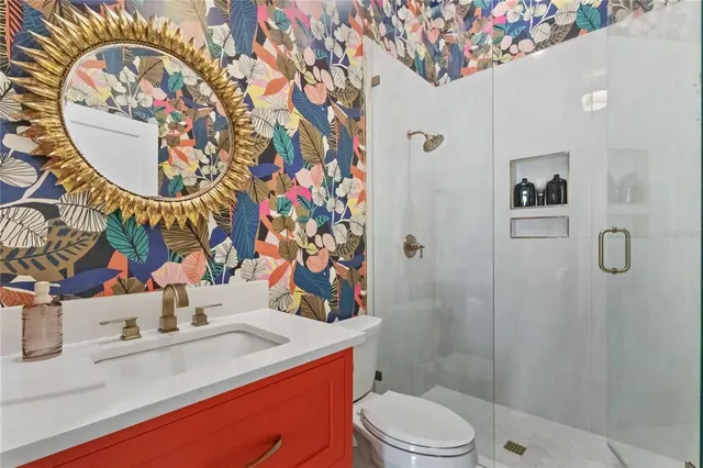 a view of a hallway with cabinet