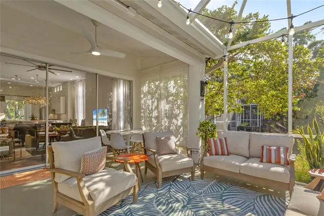 a view of a balcony with trees