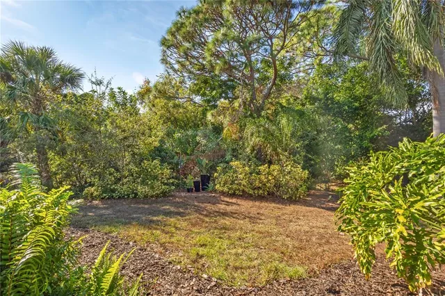 a room with gym equipment and floor to ceiling window