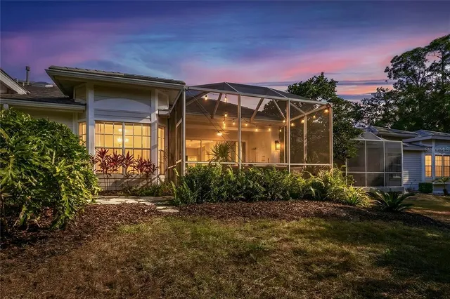 a view of yard with outdoor seating and green space