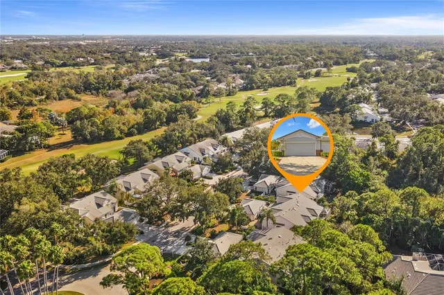 a view of backyard with a table and chair