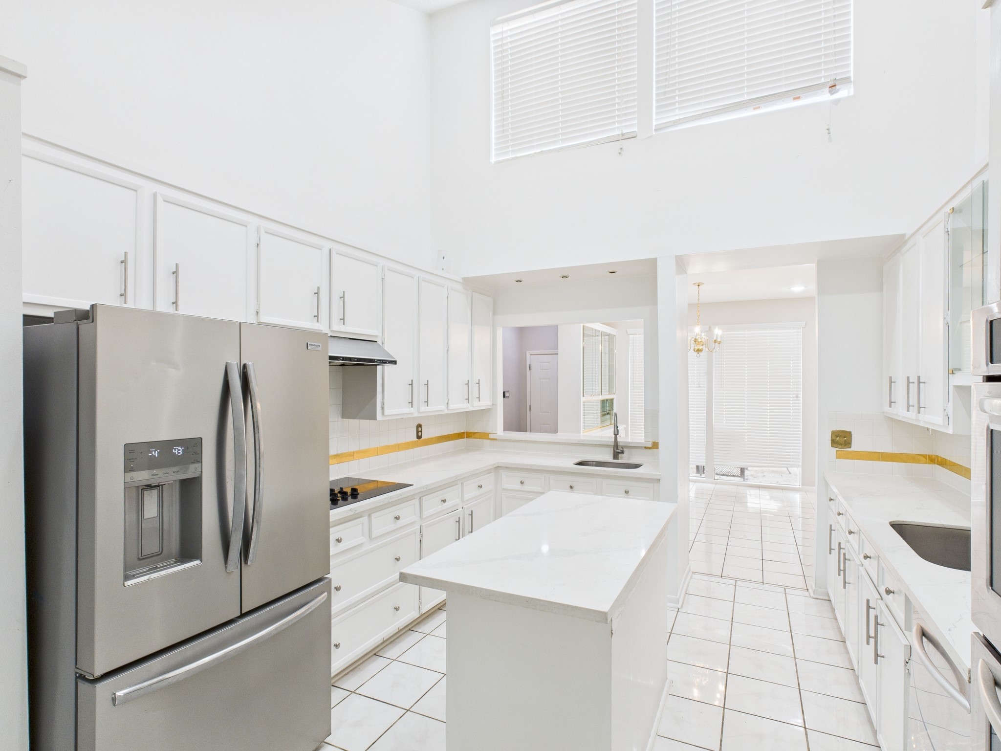 7611 Hopewell Lane Houston, TX 77071 - Photo 12 of 30 a kitchen with stainless steel appliances a refrigerator sink and cabinets