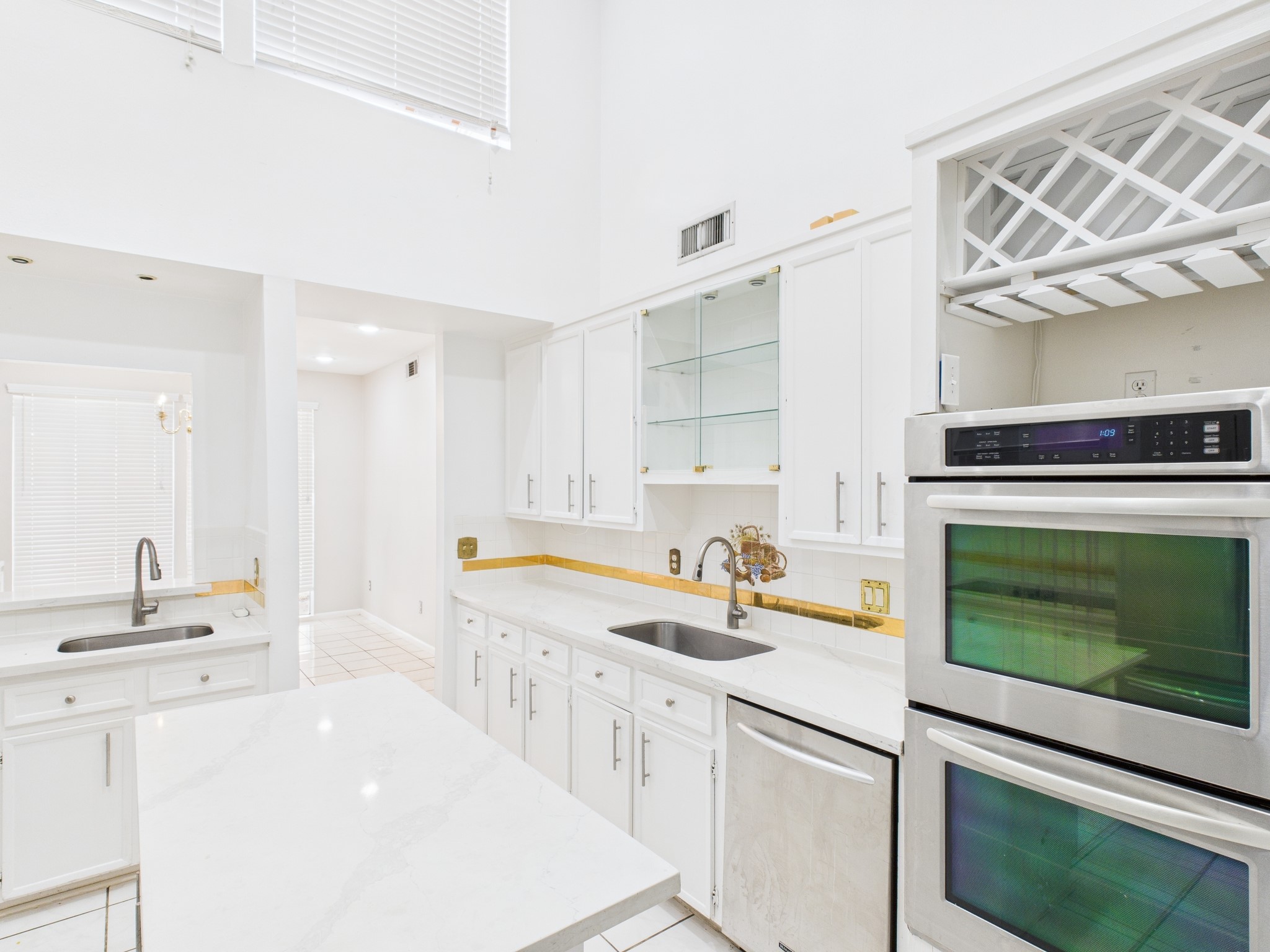 7611 Hopewell Lane Houston, TX 77071 - Photo 13 of 30 a kitchen with a sink cabinets and appliances