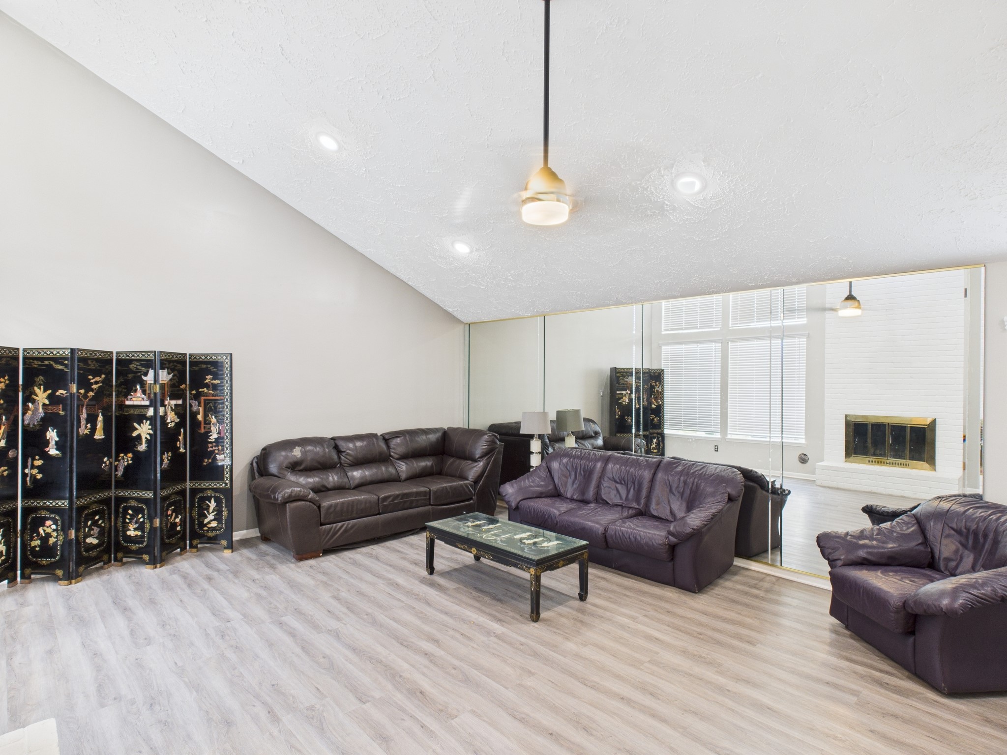 7611 Hopewell Lane Houston, TX 77071 - Photo 7 of 30 a living room with furniture a couch and a bookshelf