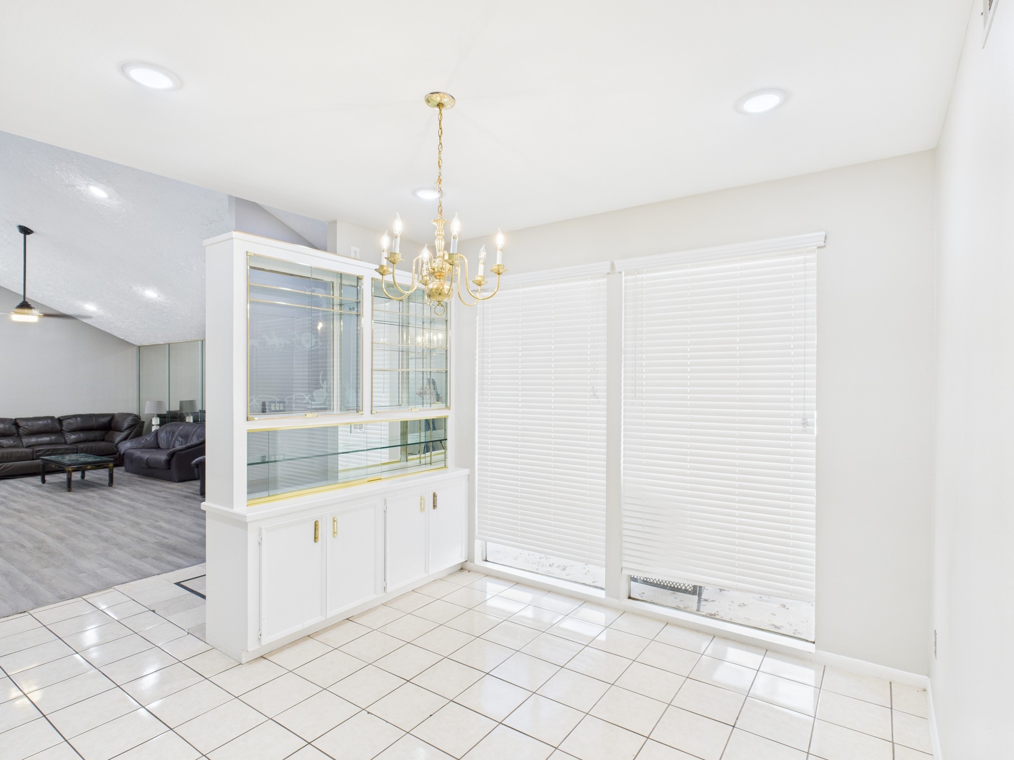 7611 Hopewell Lane Houston, TX 77071 - Photo 10 of 30 a room with lots of white furniture and wooden floor