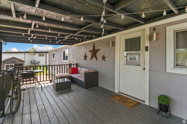 255 North 1600 West, Unit 60 Provo, UT 84601 - Photo 18 of 22 Deck featuring an outdoor living space