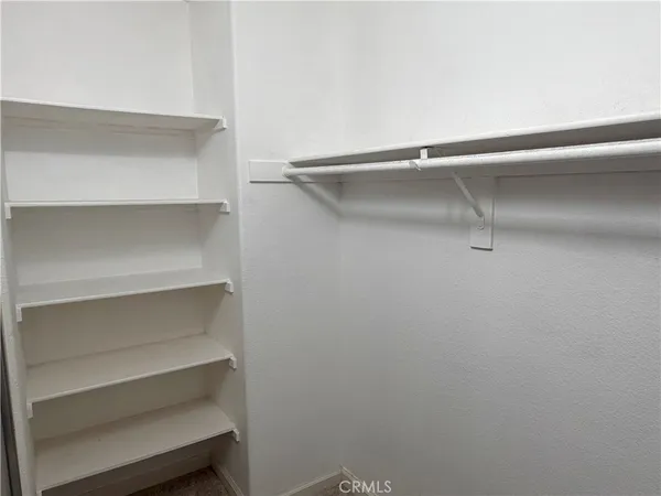 a bathroom with a shower and toilet