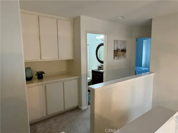a bedroom with bed and a window