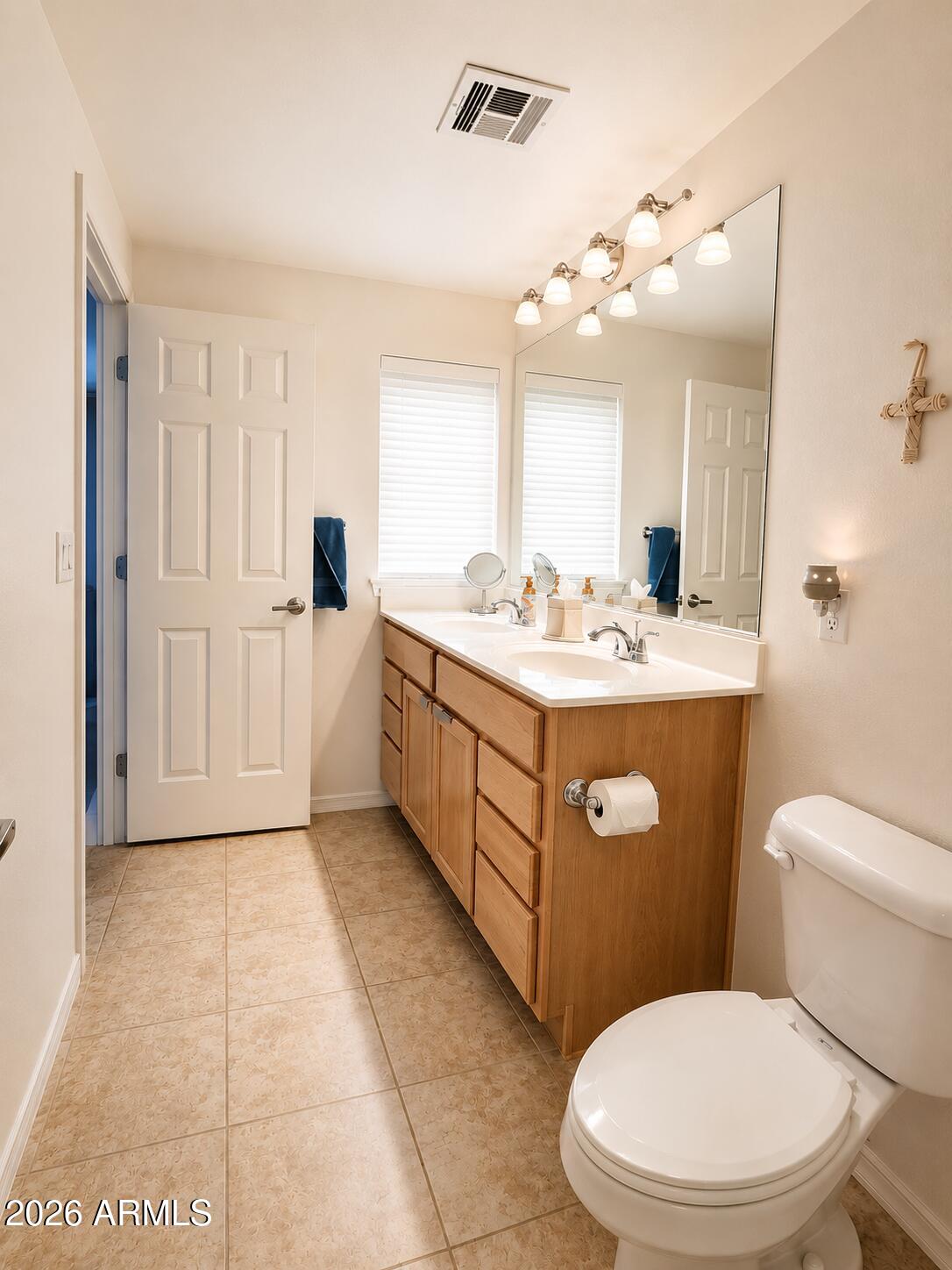 2150 West Alameda Road, Unit 1020 Phoenix, AZ 85085 - Photo 23 of 35 a bathroom with a sink a toilet and mirror